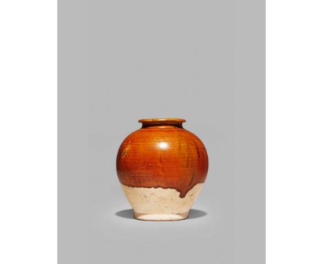 A CHINESE POTTERY SMALL OVOID VASE, TANG DYNASTY 618-907 AD Decorated with an ochre glaze draining from the rim, stopping sho
