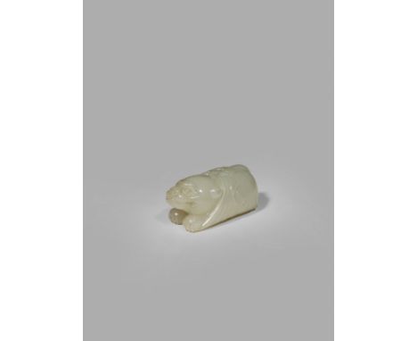 A SMALL CHINESE CELADON JADE CARVING OF A TIGER, QING DYNASTY OR LATER Crouching and wrapped in a blanket, 5cm.