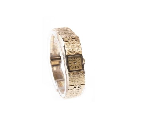 LADY'S BEUCHE GIROD NINE CARAT GOLD MANUAL WIND WRIST WATCH, the square dial with applied gold baton hour markers, 6mm case i