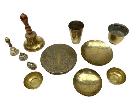 Collection of Eastern brassware to include planter, bells, dishes, mortar, gong, etc, many having engraved decoration (11)