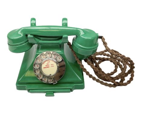 Jade green Bakelite telephone, of pyramid form with alphabet dial, brown braided handset cord and a base draw