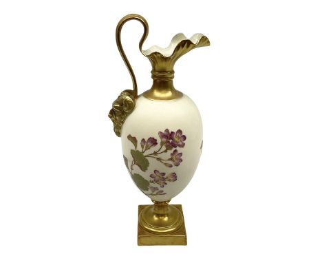 Royal Worcester blush ivory ewer with a satyr mask handle and decorated with floral sprays, raised on a gilt square base, wit