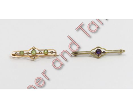 A peridot and seed pearl brooch, tagged '15', 4 cm long, 2.5 g gross; with an amethyst and seed pearl brooch, unmarked, 4.8 c
