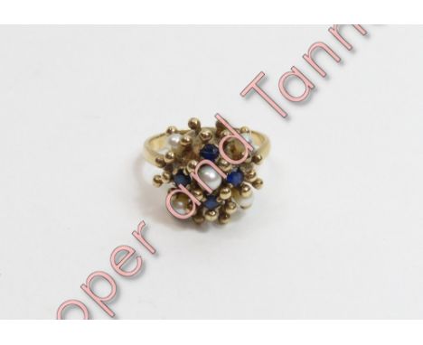 A sapphire and cultured pearl 1970s cluster ring, stamped '9ct', finger size O, 4.3 g gross