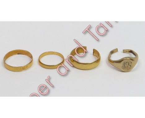 A 22 carat gold plain wedding ring; with another two 22 carat gold plain wedding rings, one cut; 8.5 g gross; with a 9 carat 