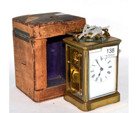 A brass striking and repeating carriage clock, circa 1890, with outer fitted case