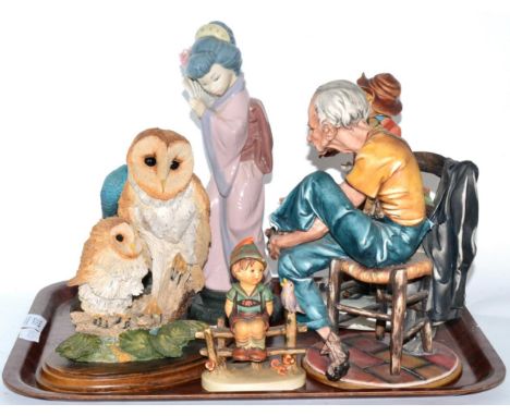 A Lladro figure, two Capodimonte figures, Goebel Western German figure and two owl artist figures 