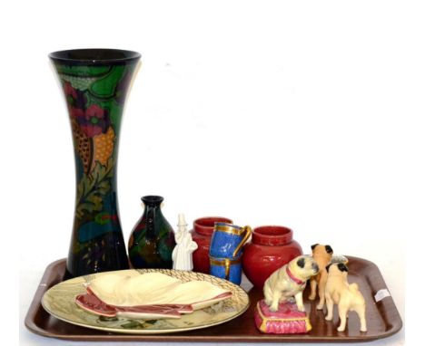 A Halcyon Days model of a seated pug on cushion, two Beswick pugs, together with other 20th century ceramics