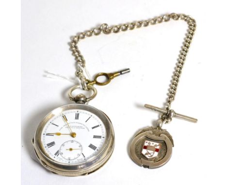 A silver open face pocket watch retailed Fattorini, with curb linked chain and attached silver and enamel medal 