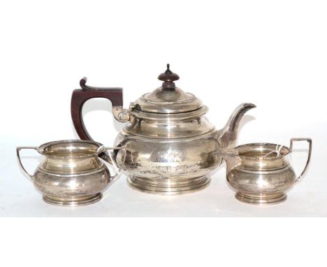 Silver three piece tea service, inscribed and dated 1925 