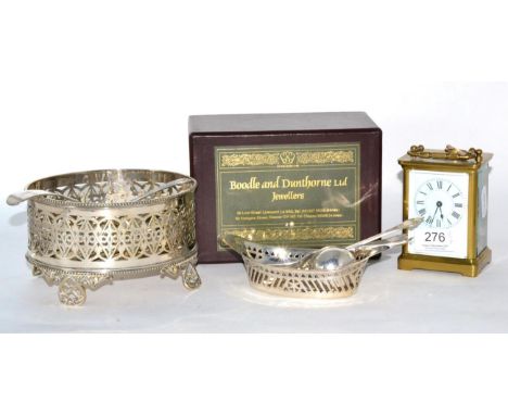 A brass carriage timepiece together with silver plated cruet stand (a.f.), various plated flatware, a pierced silver navette 