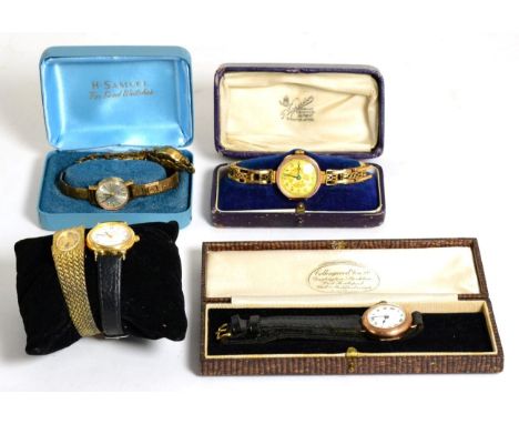 A lady's 9 carat gold Rotary wristwatch on 9 carat gold expanding strap; together with two other 9 carat wristwatches; and th