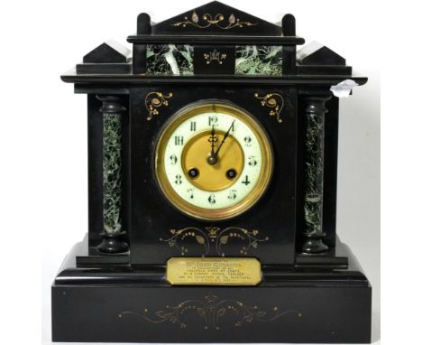 A late Victorian striking marble and slate mantel clock, with presentation plaque