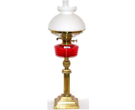 Brass oil lamp with ruby reservoir 
