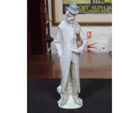LLADRO GLAZED CERAMIC FIGURE OF A GENT WITH CASED MUSICAL INSTRUMENT 