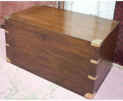 TRUNK, 19th century teak and brass bound with rising lid, 60cm H x 122cm x 61cm.