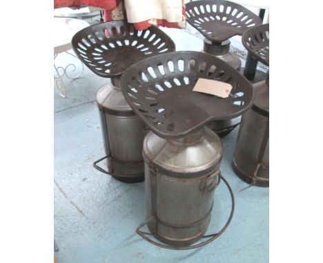 BARSTOOLS, a pair, of tractor seats, with milk churn bases. (2)
