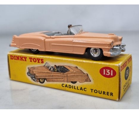 A boxed Dinky Toys No.131 pink Cadillac Tourer with spun hubs, M, box Ex