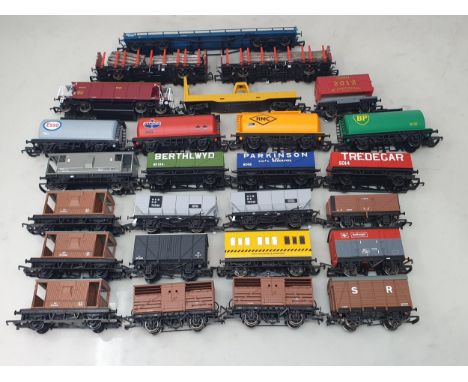 A tray of Hornby and other 00 gauge Wagons including B.R. Goods Brakes, BP Tanker, Amoco Tanker, RMC Tanker, NCB Coal Wagons,