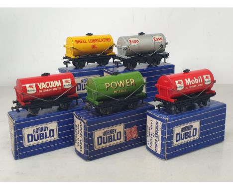 Five boxed Hornby Dublo 3-rail Tankers including Esso, Vacuum, Shell, Power Petrol and Mobil, all M, boxes all Ex plus- Nr pe