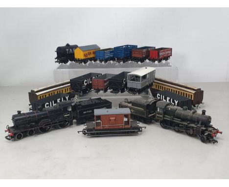 An unboxed Hornby 00 gauge Class 2P 4-4-0 in BR black livery, an unboxed Bachmann 00 gauge Ivatt Class 2MT 2-6-0, two unboxed