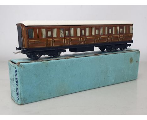 A boxed Hornby Dublo pre-war D1 LNER 1/3rd Coach, Ex plus, light crazing and staining to roof, box 11/38 VG-Ex, rusting to st