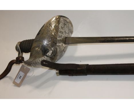 AN OFFICERS 1912 PATTERN  CAVALRY SWORD. An Officers 1912 pattern cavalry sword, complete with field scabbard and swordknot. 