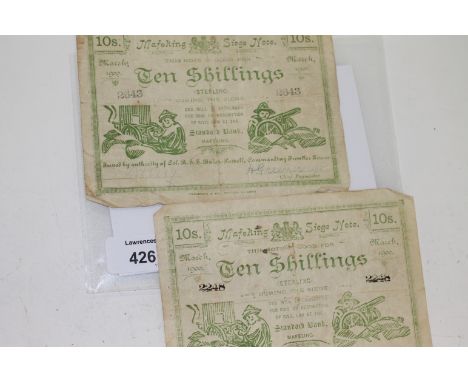 TWO MAFEKING 10/- SIEGE NOTES. An early type Siege of Mafeking 10/- note numbered 2248, with the 'd' missing in Comman-(d)-in