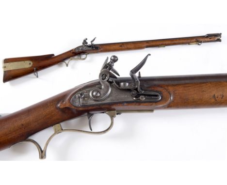 A BAKER RIFLE BY W & J RIGBY DUBLIN. A Flintlock Baker rifle with 27.1/2" barrel in brown twist finish, coarse rifling in six