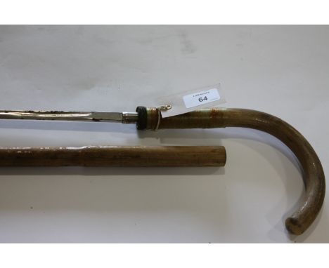 A SWORDSTICK. A Cane Swordstick with German made plated blade of 25.1/2"length with three-quarter fuller.