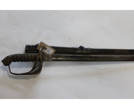 A VICTORIAN OFFICERS (WILKINSON) SWORD & SCABBARD. A Victorian Infantry Officers Sword with original scabbard, some heavy rus