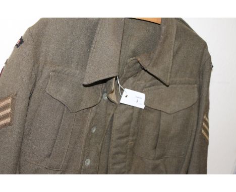 A W W 11 SERGEANTS BATTLEDRESS BLOUSE. Dated inside on the label 1941, with various sleeve devices and Pegasus cloth Parachut