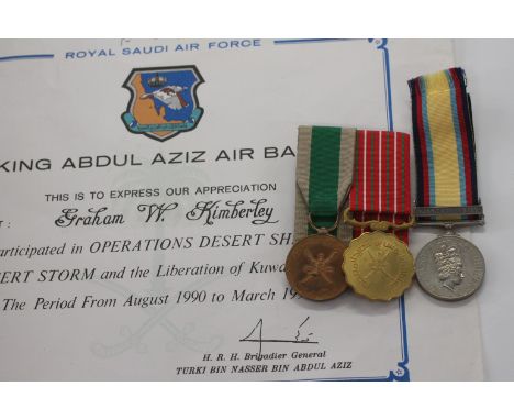 A 'CIVILIAN's GULF WAR GROUP OF THREE MEDALS etc. A Gulf War medal with bar 16 Jan to 28th Feb 1991, named to Mr G W Kimberle