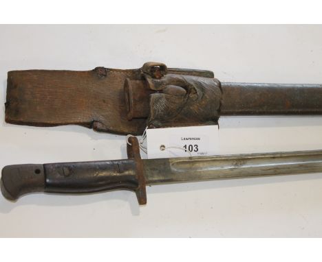 A WW1 BAYONET & SCABBARD. A 1907 pattern British Bayonet and scabbard with partial frog present. Various markings to the blad