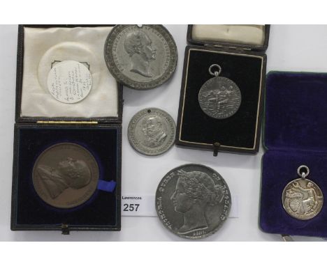 A SILVER LIFE SAVING MEDAL etc. A cased silver Life Saving award and two further cased bronze issues. A drilled Prince of Wal