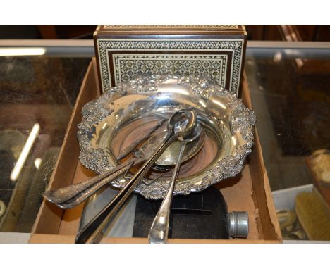 A decanter coaster, a cigarette box etc.