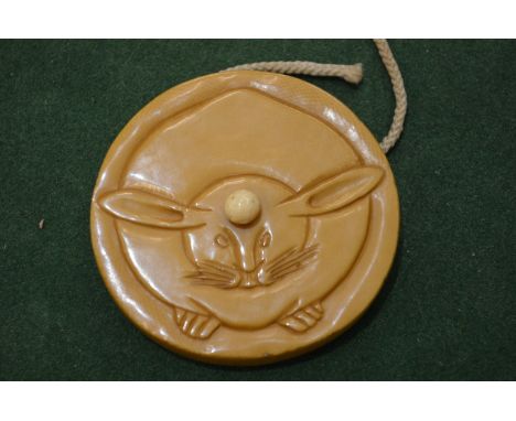 A Japanese Meiji period carved ivory netsuke of a rabbit or hare.