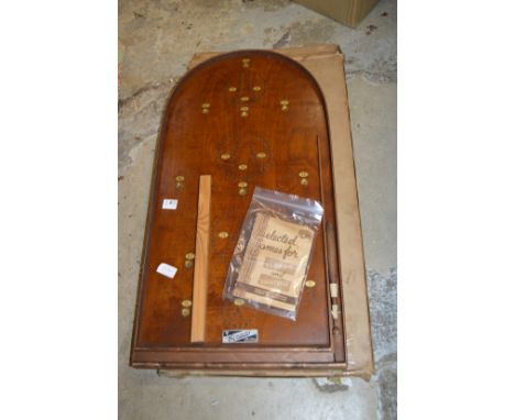 An Elrado Bagatelle game with original box and instructions.