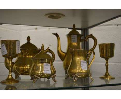 A plated tea and coffee service and a pair of goblets.