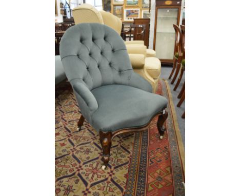 A Victorian button upholstered nursing chair.