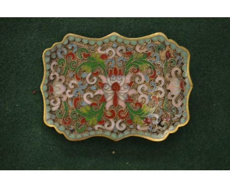 A Chinese enamel belt buckle.
