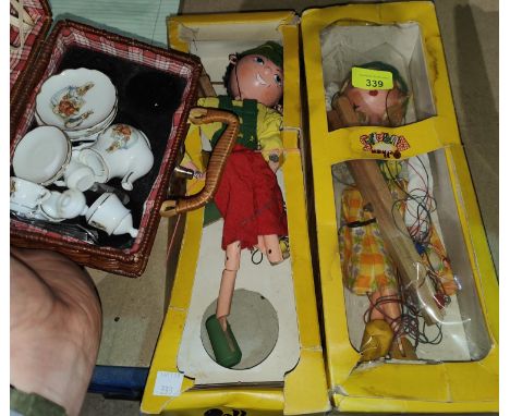 2 Pelham puppets, Tyrolean boy and girl, (boxed - 1 box a/f); a dolls fitted picnic hamper 