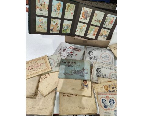 The London cigarette card album with large collection of Henry J Wix cards; another album with scenic cards; a collection of 