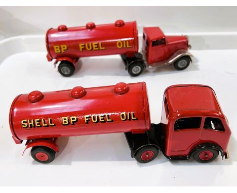 Tri-ang Minic Toys: two post war tinplate clockwork mechanical horses with Petrol tanker trailers, short bonnet red cab and h