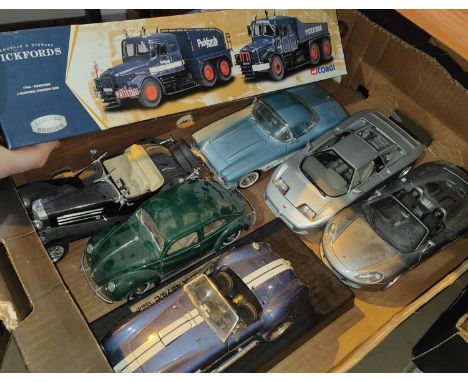 A collection of larger and smaller scale model cars, including an Ertl 1961 Corvette etc. and 6 larger vehicles. 