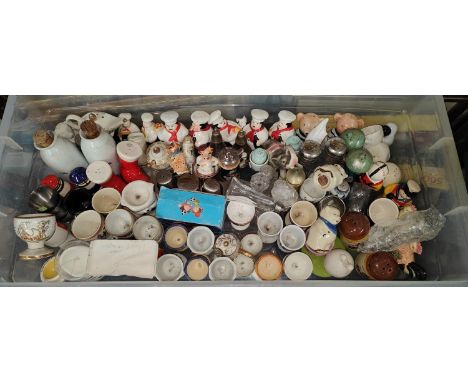 A large selection of egg cruets ceramic some novelty examples 