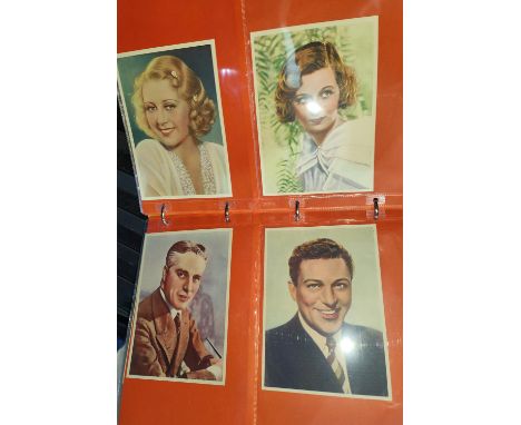 An album of Classic cigarette cards, film star actors in their studios, monochrome, on paper; a similar Cloud set printed in 