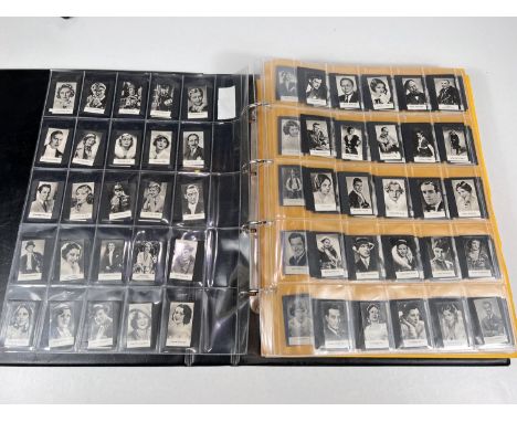 A large album of film star cigarette cards:&nbsp; Continental 220 set Bulgaria Stern Alben; Fry &amp; Sons 1-48; Godfrey Phil