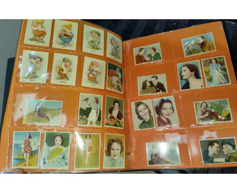 A 1920's/30's album of Westminster cigarette cards, cinema stars:&nbsp; blank back, 1-49; Beautiful Women 77 cards; African T