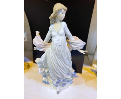 A Lladro figure of a lady with flowery dress and scarf, No 5898 